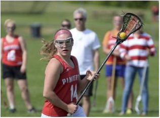 Amanda looks for an open teammate during practice.